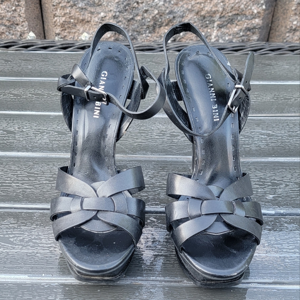 Black 5 inch High Heel Shoes. Size 10 Brand Gianni Bini.  One Heel has Knicks